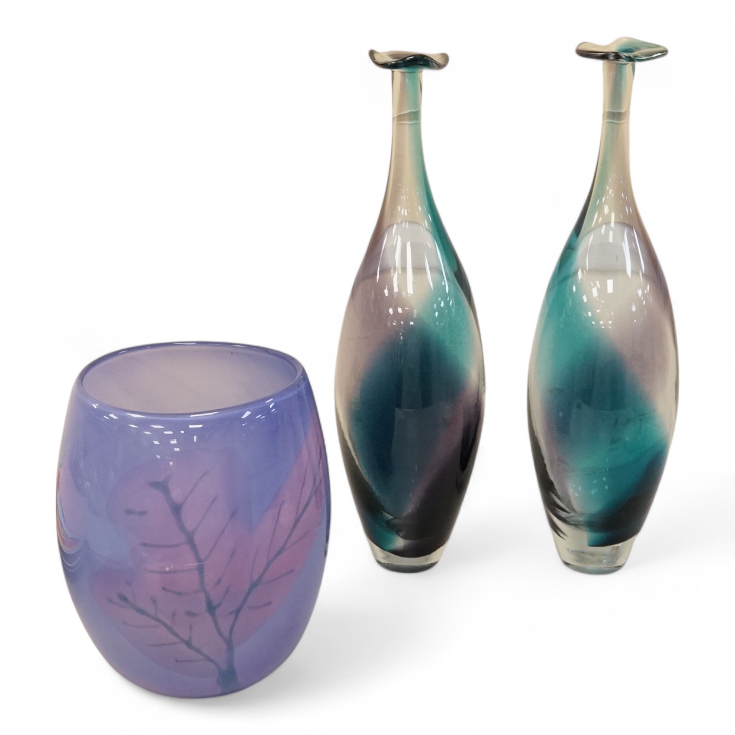 Three art glass vases to include a pair of purple and blue stem vases, 42cm high